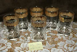 They are used with minor gold paint loss spots here and there but still nice very clean set of glass ware. We do not...