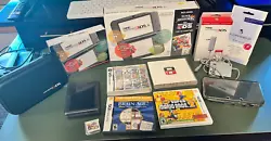 Super Smash Bros. 3DS (exclusive included with console). Excellent used condition Nintendo New 3DS XL in black. Great...