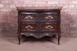 By Henredon. A gorgeous French Provincial Louis XV style bombay chest or commode. Carved walnut, with original brass...