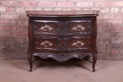 By Henredon. A gorgeous French Provincial Louis XV style bombay chest or commode. Carved walnut, with original brass...