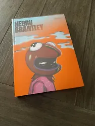 This autographed book by Hebru Brantley is a highly sought after item for art enthusiasts. With its hardcover format...