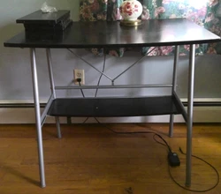 small computer desk with shelves. couple of light scratches.
