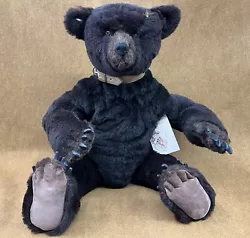 What a cool bear! Very rare. Armature jointed arms so you can put them in nearly any position. Original tag still...