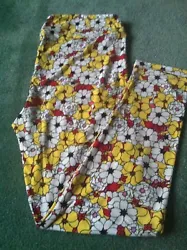This is a BNWOT LuLaRoe TC2 leggings. TC2 leggings fit sizes 18+. It is a floral print in yellow & white. It is 92%...
