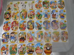 38 cartes asterix cora sur 40 (manque 20 et 39) + 10 doubles et 10points asterix 2023