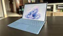 This Microsoft Surface Pro 9 is a powerful and versatile device for all your computing needs. With its sleek design and...