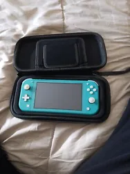 Nintendo Switch Lite Console Portable - Turquoise. Servi 1 foi pas intéresser pa de rayure rien