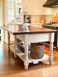 TOP NOT INCLUDED Handmade out of solid maple and crafted here in Delaware, this kitchen island was designed after an...