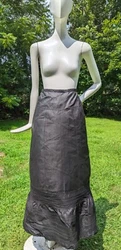 FULLY STRONG AND WEARABLE. CAN BE WORN AS A PETTICOAT OR A SKIRT. FASHIONED OF A STIFF DULL FINISH BLACK GLAZED COTTON...