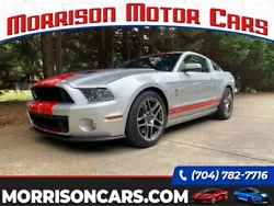 2013 Ford Mustang Shelby GT500 Coupe with 13K Miles. Ingot Silver Metallic with Red Stripe Exterior Color and is riding...