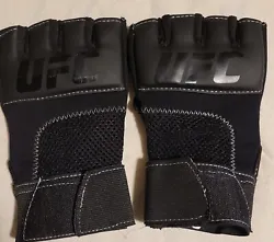 Pre-owed UFC MMA Gel Training Gloves are made with durable and stretchable neoprene for a comfortable, secure fit. Gel...