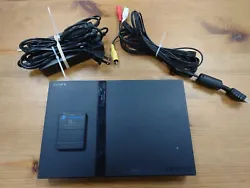Includes:  - PlayStation 2 Slim console, tested and working - AV cables - Power cord - Memory card