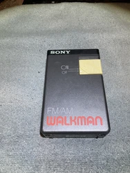 No headphones or buds. 1984 Sony Model: SRF-19W Superheterodyne Semiconductor. Tested and works good.