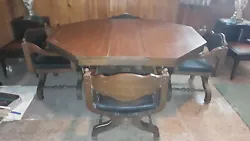 Dining room table and chair set. Expandable with center leaf. This set is old and has signs of wear. Can be a good...