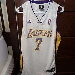 Show off your love for the Los Angeles Lakers with this vintage Lamar Odom #7 jersey from Adidas. This mens size medium...