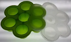 Ice cream/jello mold. Green silicone with white lid.