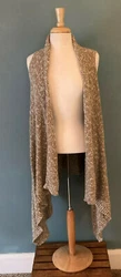 This basket weave cascade-front vest crafted without side seams is sensible luxury, soft and lightweight....