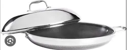 Elevate your cooking game with this premium 14-inch fry pan from Hexclad. This versatile pan is compatible with all...