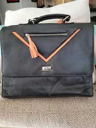 leather messenger bag. Bought and as good as brand new. Never use. Fit 15 inches labtop.