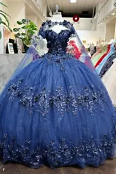BEAUTIFUL NAVY 3D FLOWER AND GEM QUINCEANERA BALL GOWN. SIZE MEDIUM  FITS 4 TO 8 BECAUSE OF CORSETTED BACK....