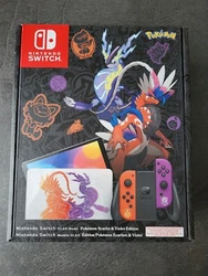 Console Nintendo Switch OLED Edition Pokémon Ecarlate Et Violet Collector.  Jeu non inclus dans le package.  Neuve,...