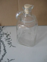 For consideration I have from my Grandparents estate the Antique Glass Salad Dressing Oil and Vinegar Bottle as shown...