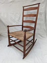 Antique Shaker Rocking Arm Chair size stamped 5 with shawl bar. The number 5 chair is estate fresh in good condition...