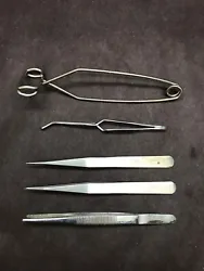 1 Roboz forcep pointed tip with inward bent ends. - 1 small angled test tube tong/clamp, grip expands 13mm. - 1 test...