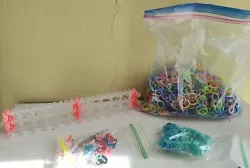 Rainbow Loom Lot. 4 miniature crochet hooks. The looms and hooks are used, but most of the bands are new. 1 large bag...