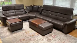 This beautiful leather sectional couch, perfect for your living room, comes with an ottoman and footstool included. The...