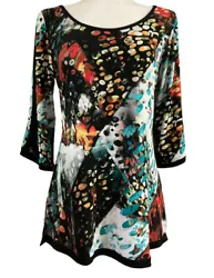 Add a pop of color to your wardrobe with this beautiful Papillon Blanc Artsy Multicolor Abstract Tunic. Papillon Blanc...