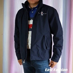This jacket is equipped for the high seas with a fold away hood, interior pocket, and adjustable button closure at...