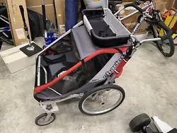 Thule Cougar 2 Double Sport Stroller with storage basket on top. This has been well used with life left. This stroller...