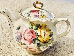 This vintage Sadler “Pink and Yellow Roses” teapot is a charming addition to any tea party. With a beautiful floral...