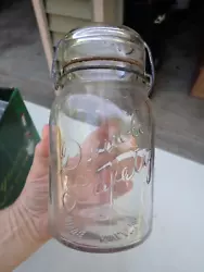 Double safety mason jar with wire bail.