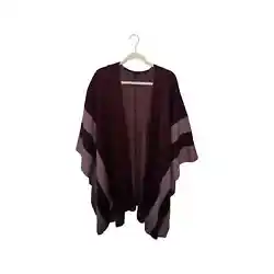 With a modern drape and flow, this tipped open poncho is always an easy, cozy layer to add on to any outfit. - Open...