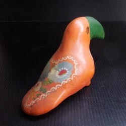 Matières : céramique. Couleurs : orange vert multicolore. Motif animalier : oiseau. A partir de ce modèle, des...