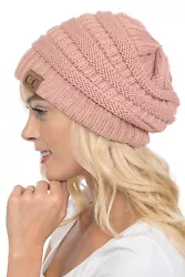 A classic cable knit beanie perfect for any occasion. Ideal for colder seasons and outdoor activities. Wear it for...