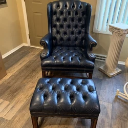 Nice Leather wing back chair and Ottoman set. Ottoman is 26 X 16.5 and 16 tall from floor. Chair back is 29 in high...