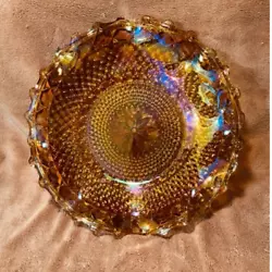 Beautiful shallow bowl/candy dish features very pretty amber/gold rainbow carnival glass, ruffled diamond cut edges,...