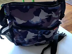 Great Skip Hop Duo Blue Camo Pattern Canvas Diaper Bag. Back Velcro Pocket. One Side Velcro Pocket. Velcro Center...