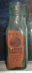 Antique aqua glass horse radish bottle. Near complete H D Geer paper label Three Rivers MA. Hand tooled lip rim....