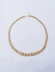 This piece is stamped 585 (14k gold) Tiffany & Co. I love the elegance of this piece, and also looks lovely layering...