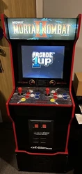 Arcade1up Mortal Kombat 2 machine with the matching riser. The machine’s basically brand new I’ve played it maybe 3...