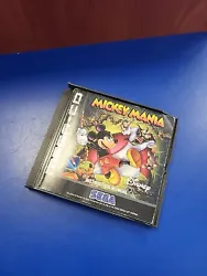 Sega Mega CD Mickey Mania.  Boîte cassée, manque lavant et la jaquette avant  Jaquette arrière présenté ainsi que...