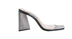 An angular block heel covered in shimmering crystals adds height and sparkle to this sophisticated, modern sandal. 3...