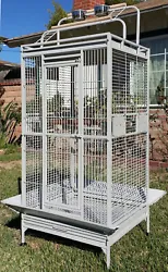Cage features both vertical and horizontal bars for your birds climbing pleasure. Removable trays at play top and...