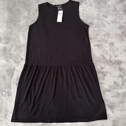 An adorable minimalist tencel/lyocell dress from Eileen Fisher. Retailed for $158. Perfect for a capsule wardrobe! Size...