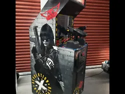 Revolution-X shooting arcade game from Midway. Good working condition. Includes great gameplay, and of course Aerosmith...