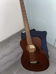 acoustic bass guitar used. Works completely fine , nothing wrong just not interested in it anymore. Sitting and...